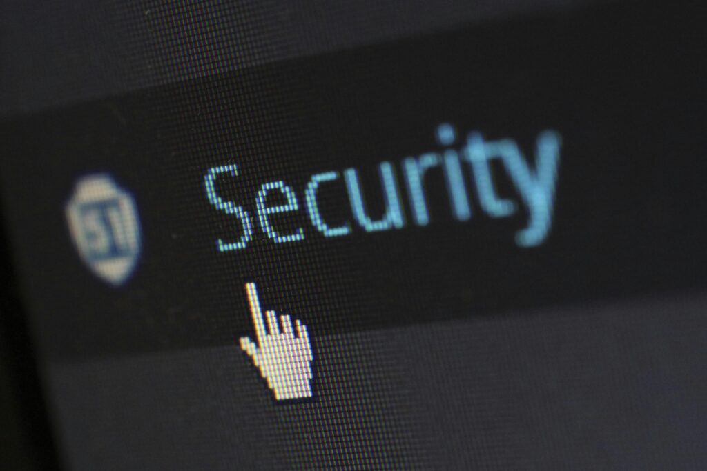 security-protection-anti-virus-software-60504-60504-1 Close-up view of a mouse cursor over digital security text on display.