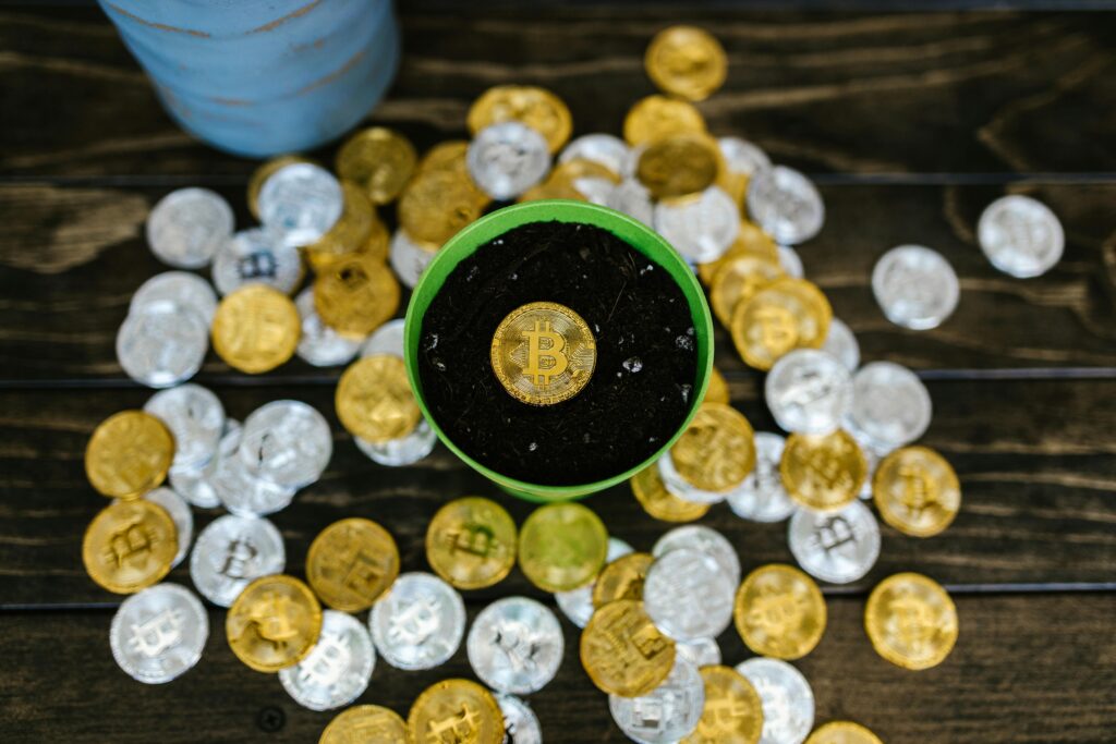 A creative still life of bitcoin coins in a pot, symbolizing growth and investment.